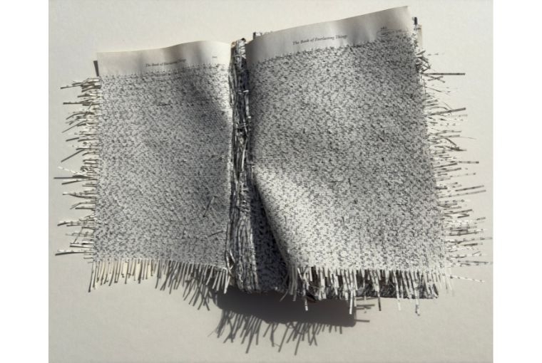 Blueprint12 at Art Mumbai 2025  Youdhisthir Maharjan The Book of Everlasting Things (pp.343-365), 2025 Had woven book strips on reclaimed book 15 x 10 1/2 x 4 in 38.1 x 26.7 x 10.2 cm